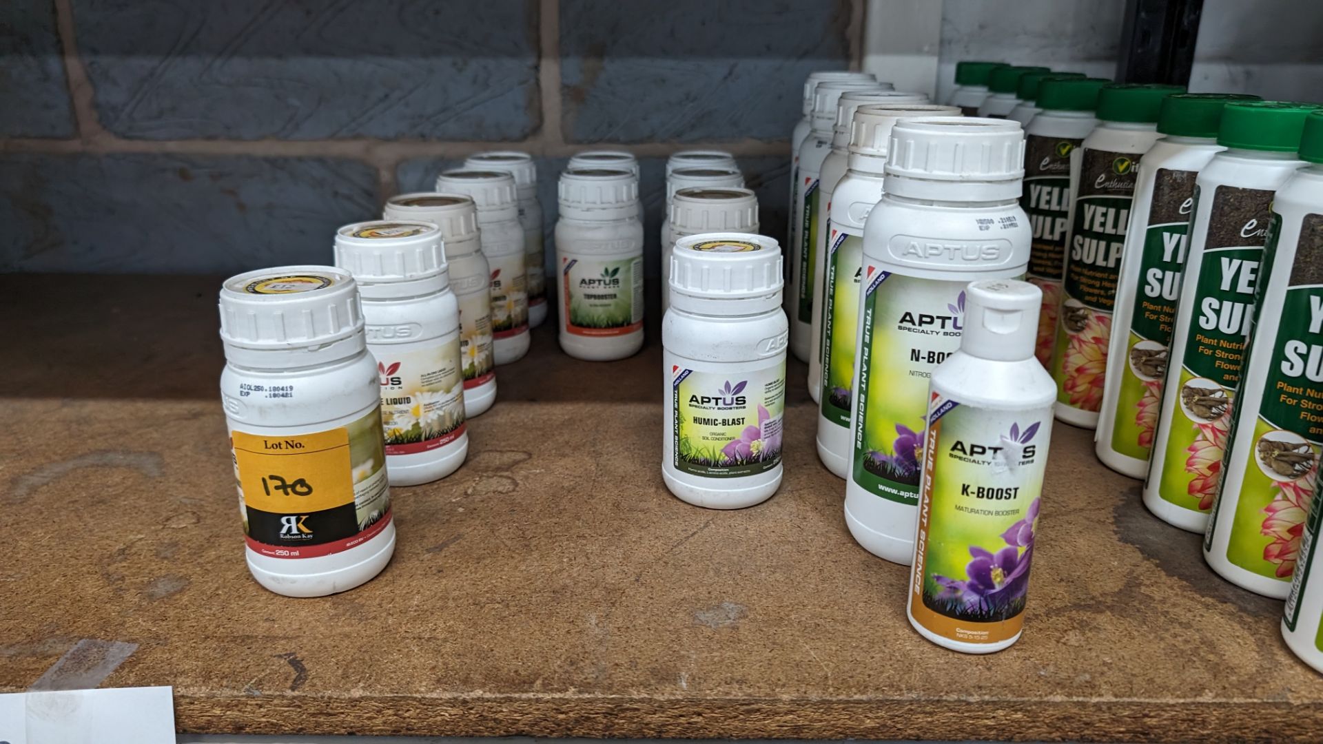 17 assorted sized bottles of assorted Aptus Nutrition products