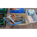 The contents of a crate of hand saws