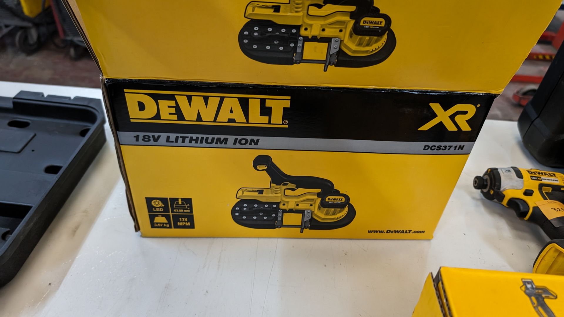 DeWalt XR model DCS371N cordless bandsaw. Bare unit, no battery or charger. Appears new & unused - - Image 7 of 8