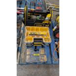 Row of DeWalt cases comprising open top tool bag plus 3 plastic cases