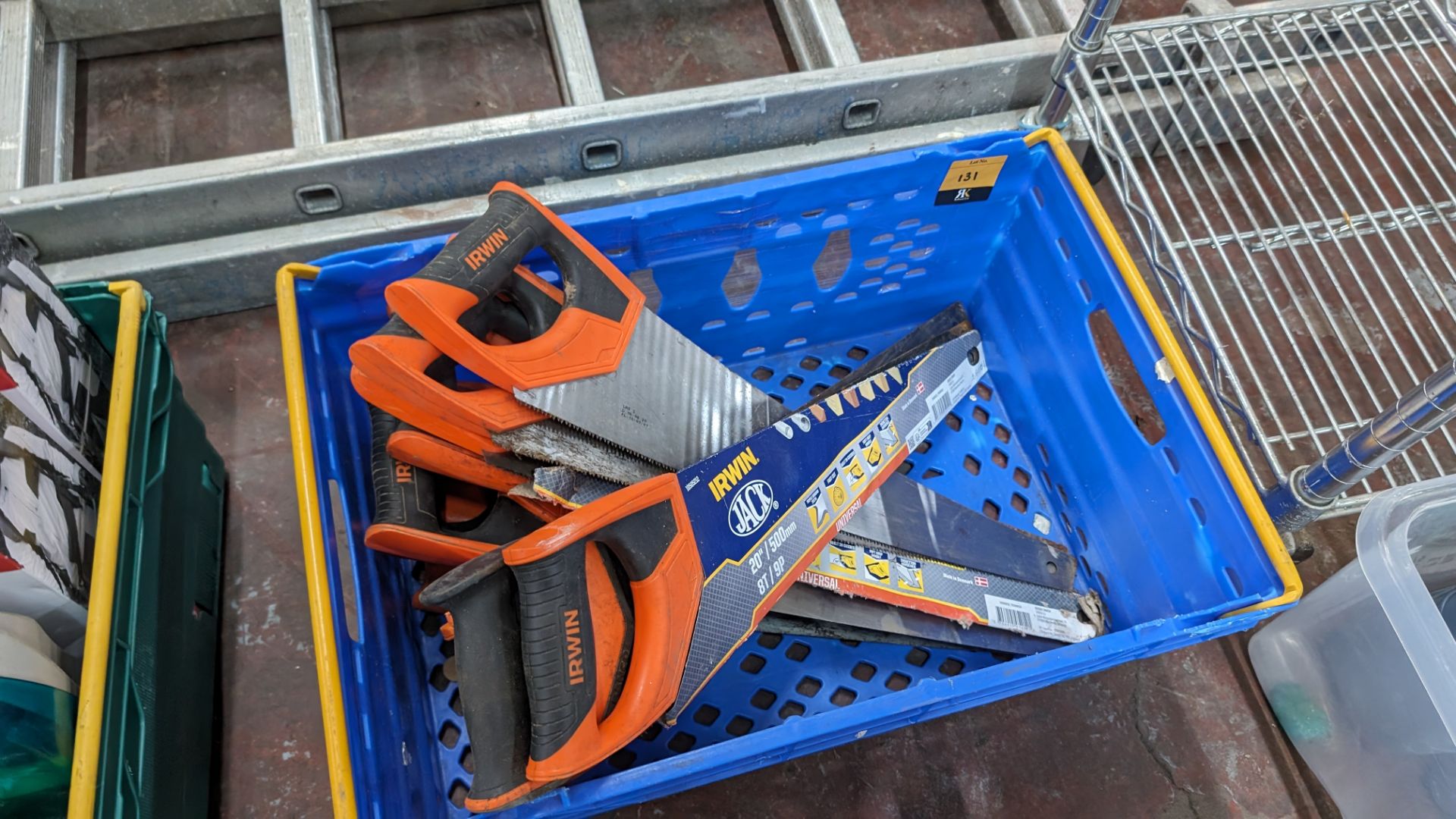 The contents of a crate of hand saws