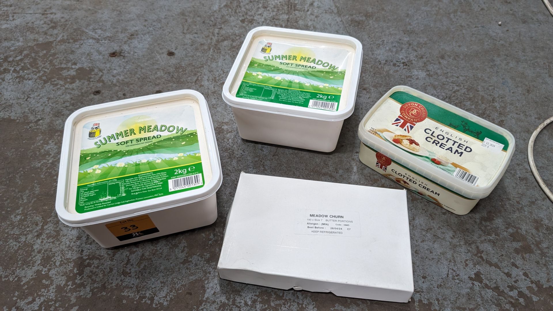 2 off 2kg tubs of Summer Meadow soft spread plus box of Meadow Churn individual packets of butter (1