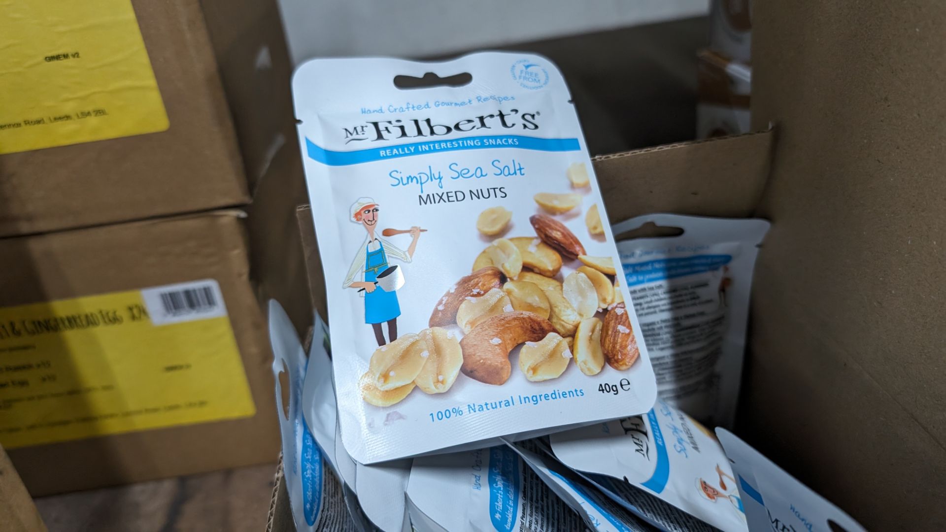 20 packets of Mr Filbert's simply sea salt mixed nuts, each bag containing 40g of product, with a be