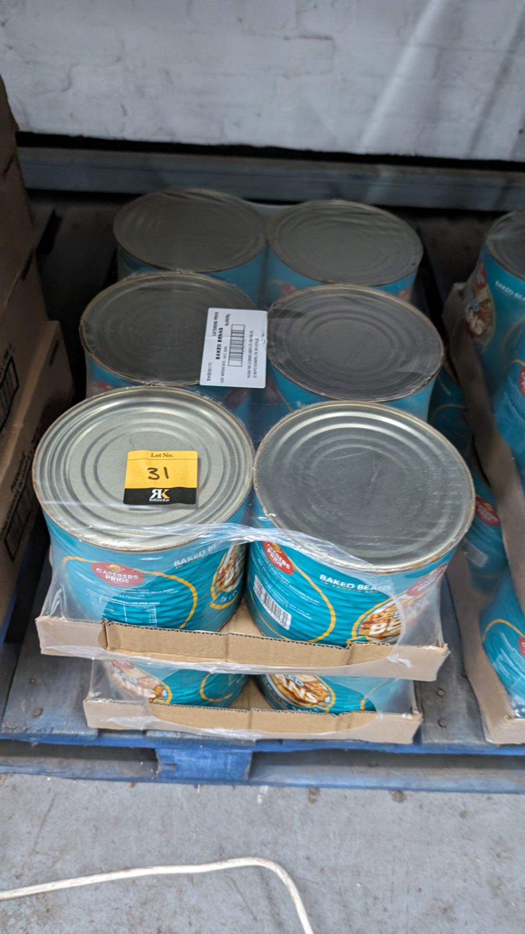 12 off 2.62kg tins of Caterer's Pride baked beans, best before date October 2025