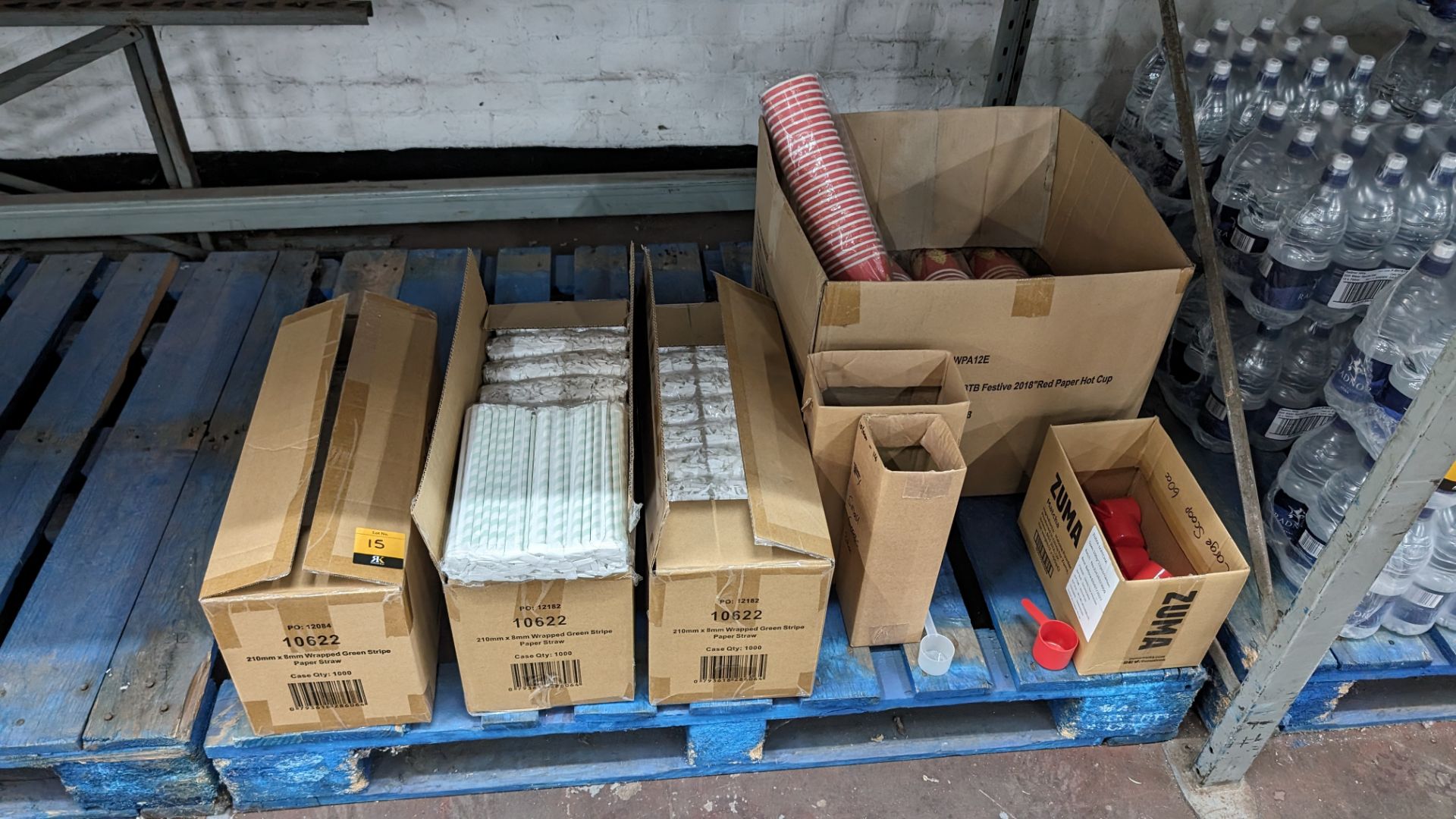 The contents of a pallet of paperware comprising straws & cups. This lot also includes 3 small boxe