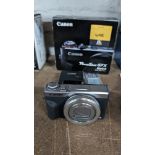 Canon PowerShot G7X Mark II camera, including battery and charger