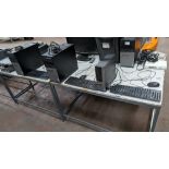 3 off desktop computers each including keyboard and mouse