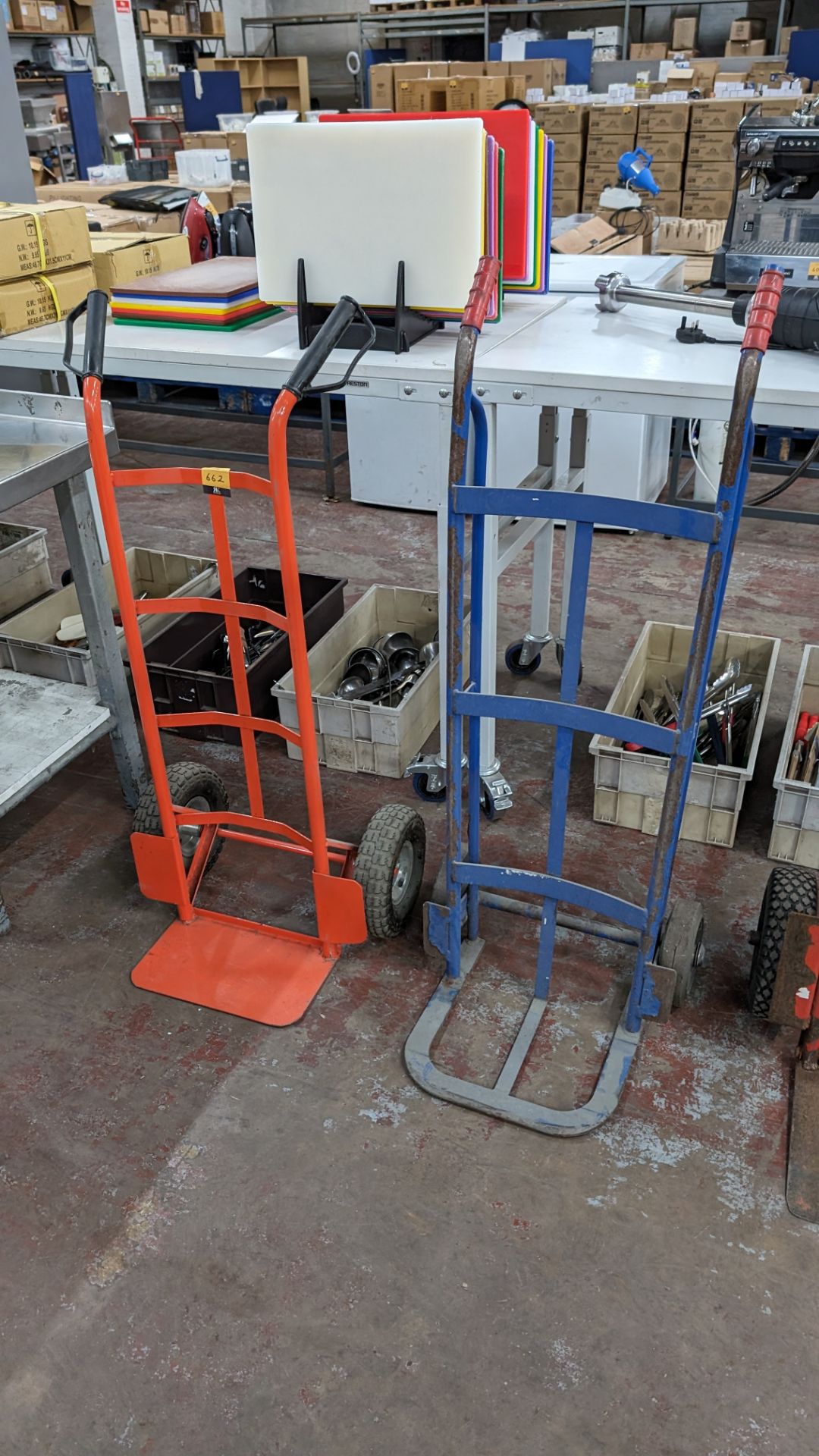 2 off metal sack trucks (one red, one blue)