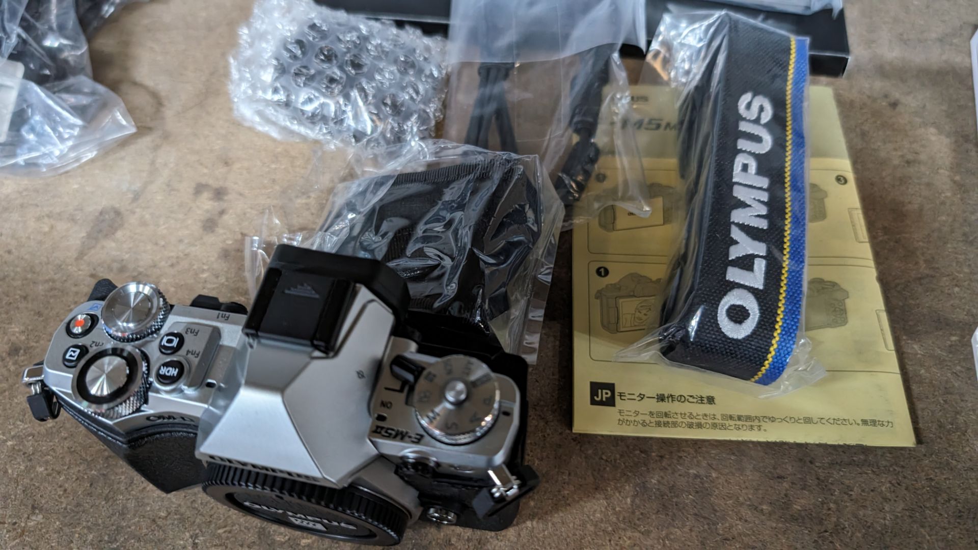 Olympus OM-D E-M5 Mark II camera kit, including camera body, electronic flash, strap, battery, charg - Image 6 of 12