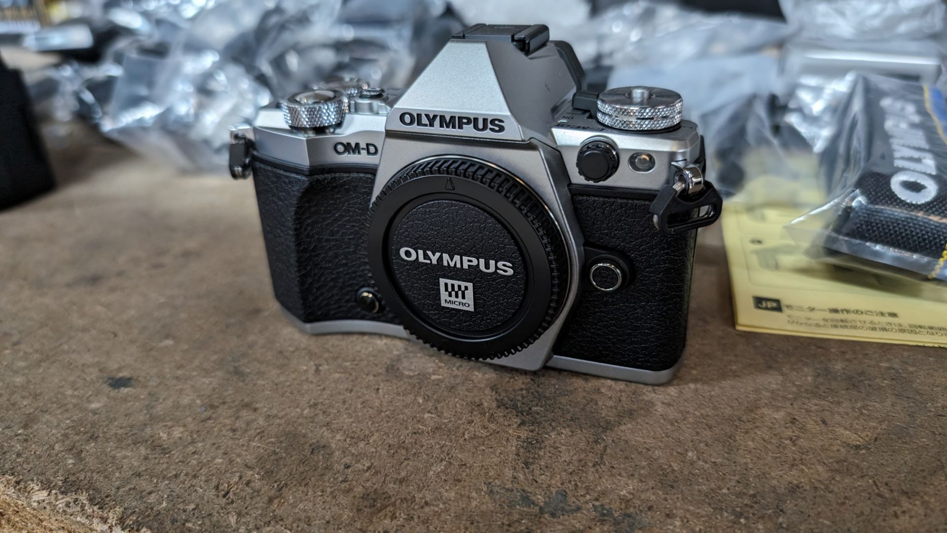 Olympus OM-D E-M5 Mark II camera kit, including camera body, electronic flash, strap, battery, charg - Image 8 of 12