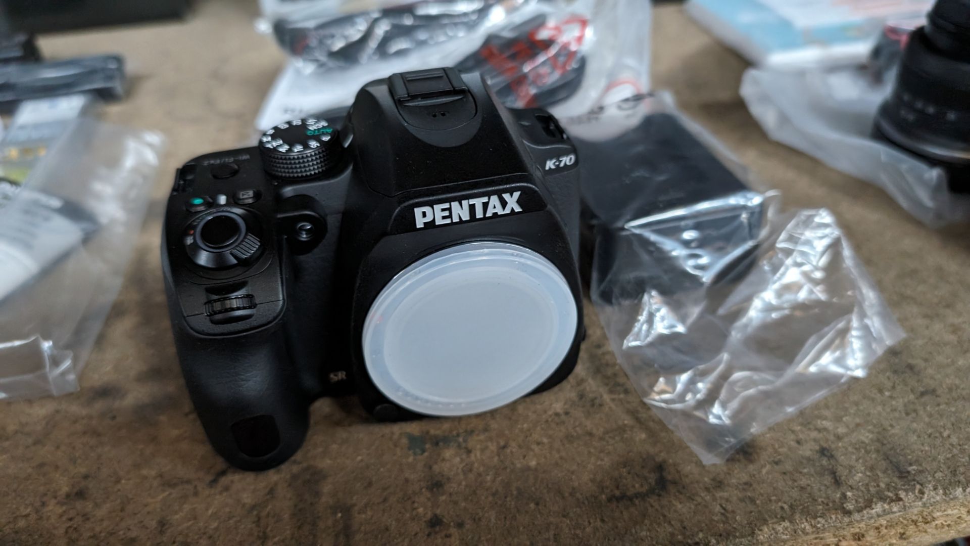 Pentax K-70 camera body, including strap, cable, battery and charger. NB: The box shows a lens, ho - Image 11 of 14