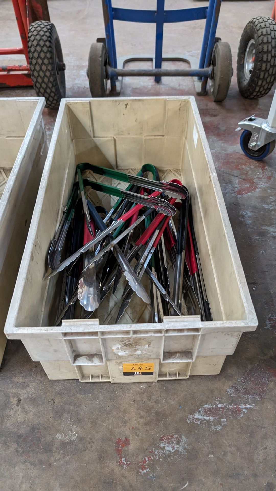 The contents of a crate of tongs