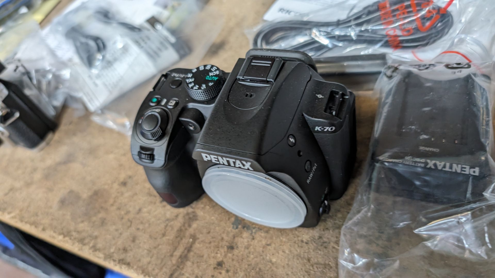 Pentax K-70 camera body, including strap, cable, battery and charger. NB: The box shows a lens, ho - Image 3 of 14