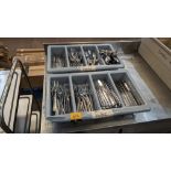 2 trays of cutlery and their contents