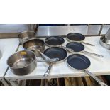 8 assorted saute pans and similar