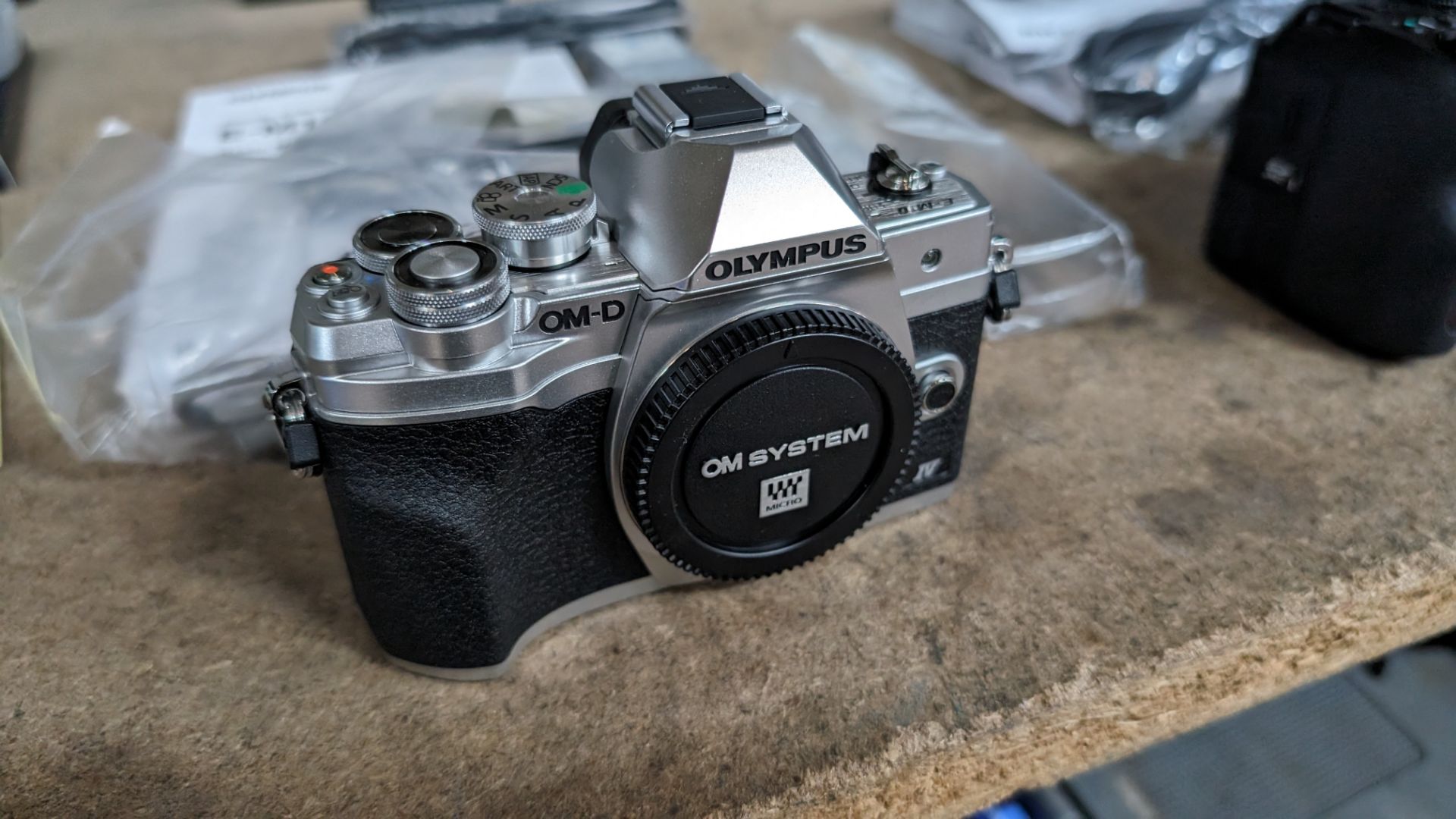 Olympus OM-D E-M10 Mark IV camera, in box, including strap, battery, adaptor and cable - Image 2 of 13