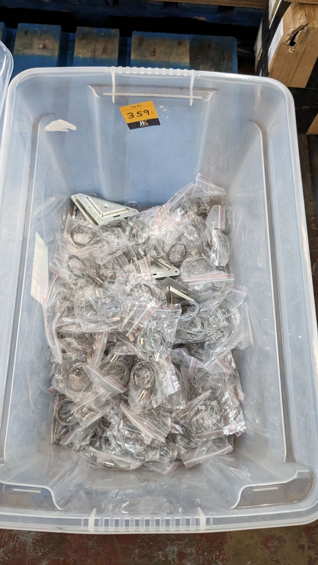 The contents of a crate of wire cable and fixing plates. For use with A1 and A2 panels