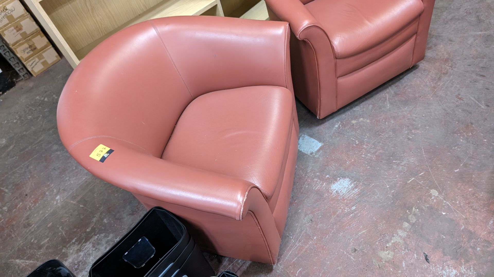 Pair of tub chairs on wheels in dark salmon/terracotta leather/pleather finish - Image 4 of 8