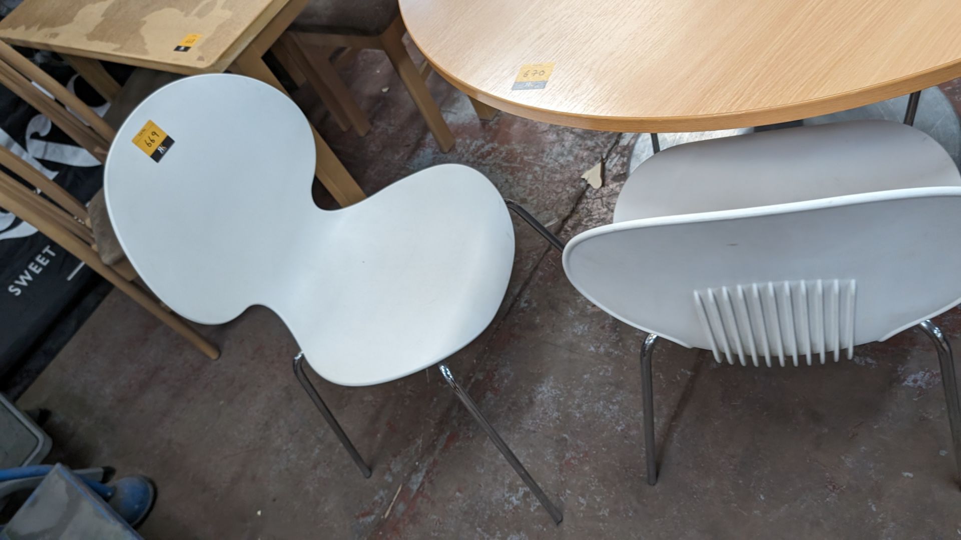 4 off matching white chairs on metal legs