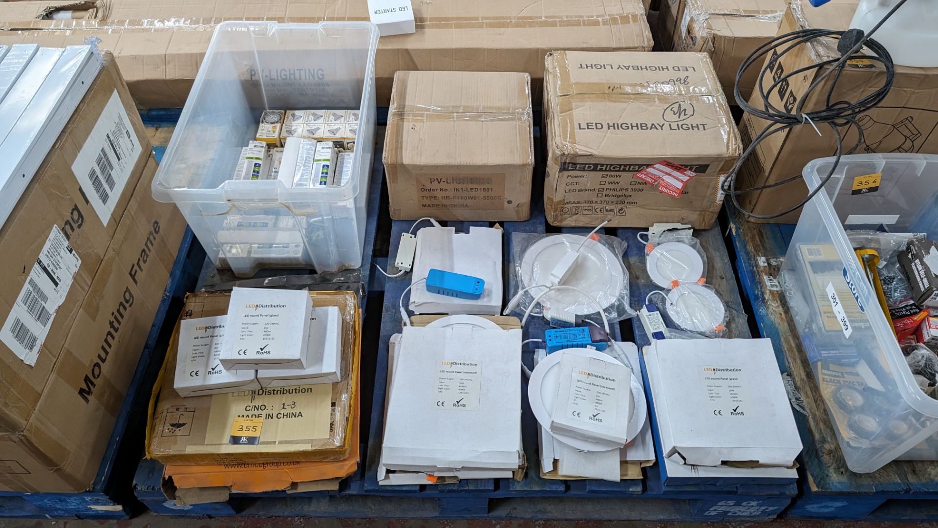 The contents of a pallet of assorted lighting products, including lamps, bulbs and drivers