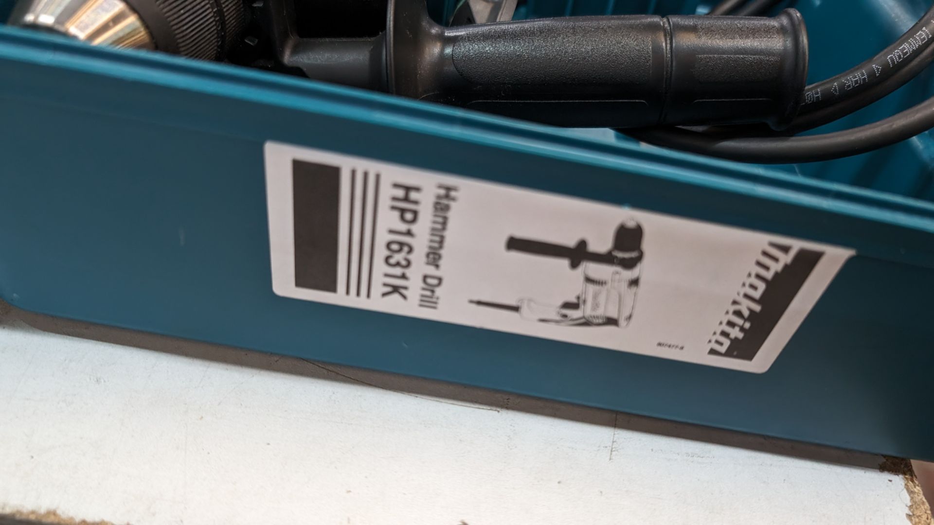 Makita drill model HP1631 in dedicated case with fixings storage - Image 5 of 9