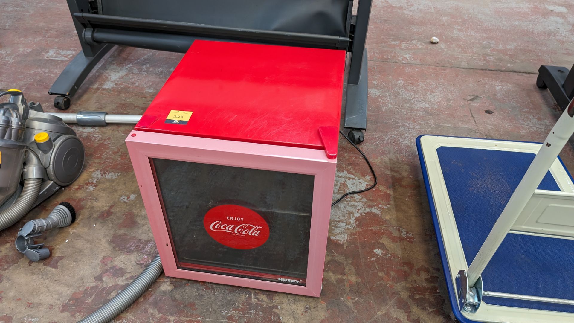 Husky clear front drinks fridge with Coca Cola branding