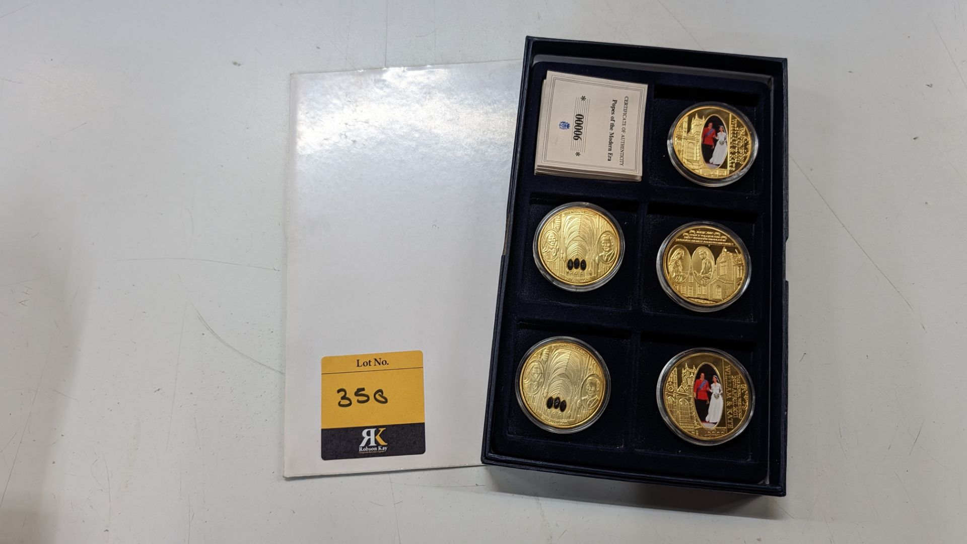 5 off assorted decorative coins as pictured including presentation box