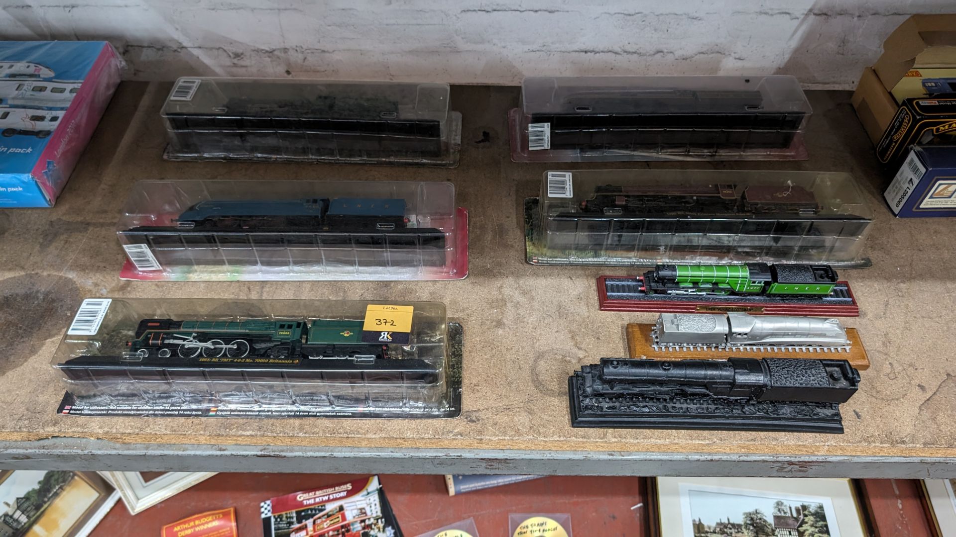 8 assorted large model trains