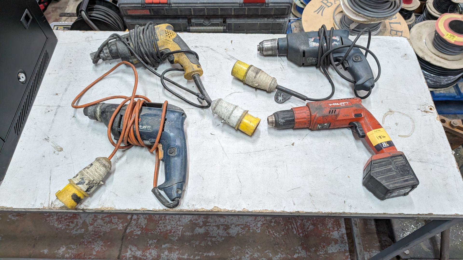 4 off assorted drills by Bosch, DeWalt & Hilti - this lot comprises 3 off 110V drills & 1 off cordle - Image 2 of 7