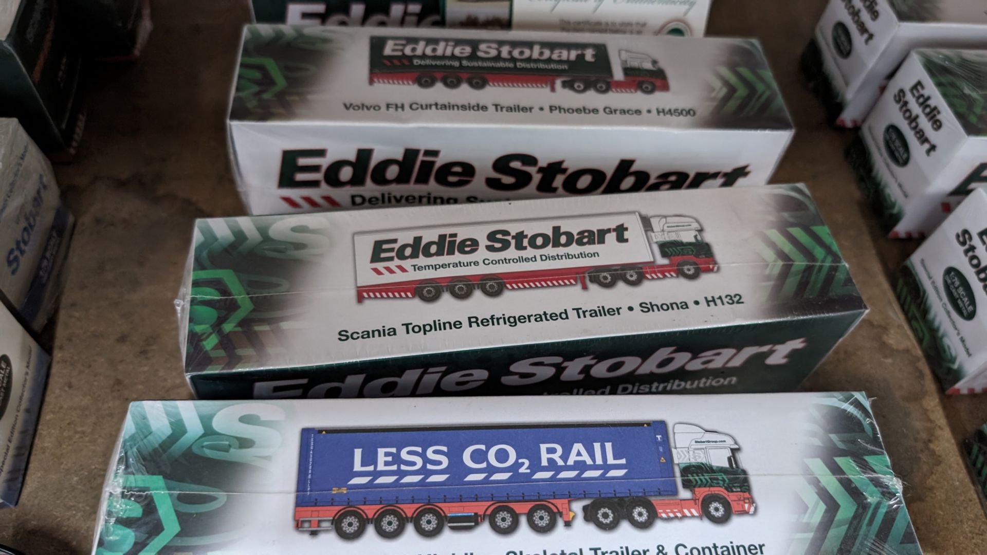 Mixed Eddie Stobart lot comprising 12 assorted model vehicles plus tin of coasters - Image 11 of 15