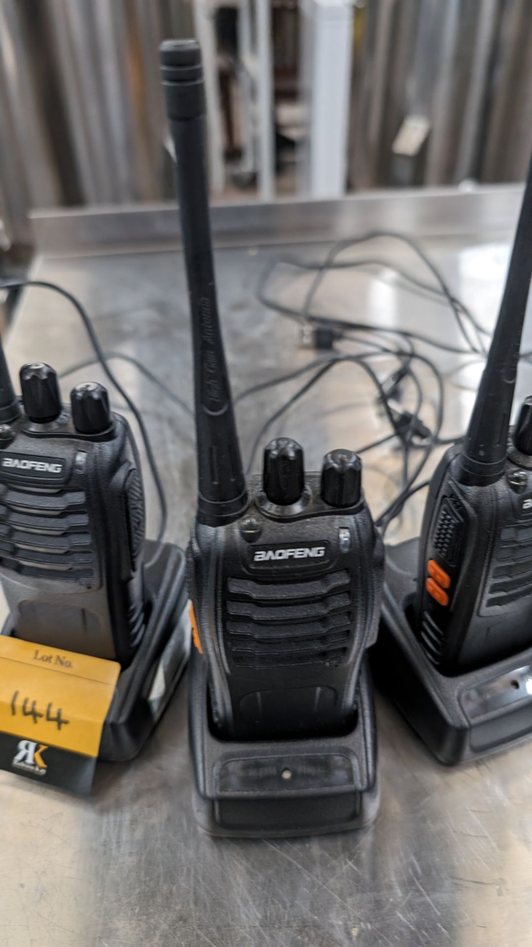 4 off Baofeng walkie-talkies each with their own charging base - Image 5 of 7