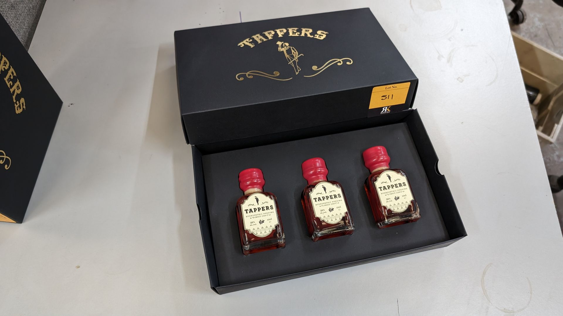 3 off 100ml bottles of Tappers Hydropathic Pudding Fruit Cup, 32% ABV, including a Tappers branded p