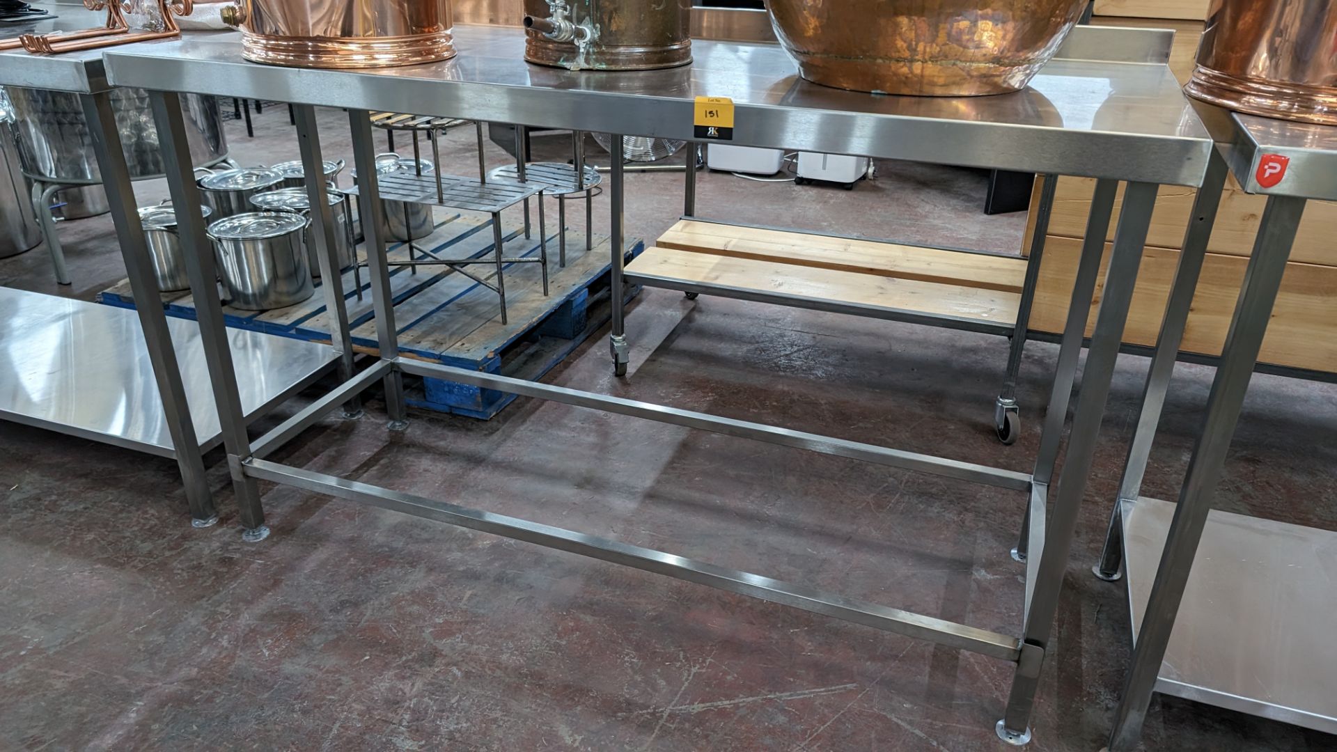 Stainless steel table with upstand at rear, max dimensions: 920mm x 600mm x 1300mm - Image 2 of 4
