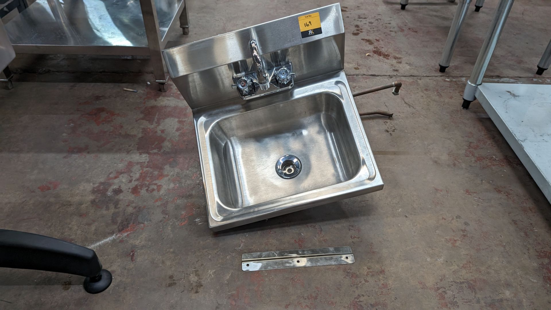 Wall mountable stainless steel basin with mixer tap