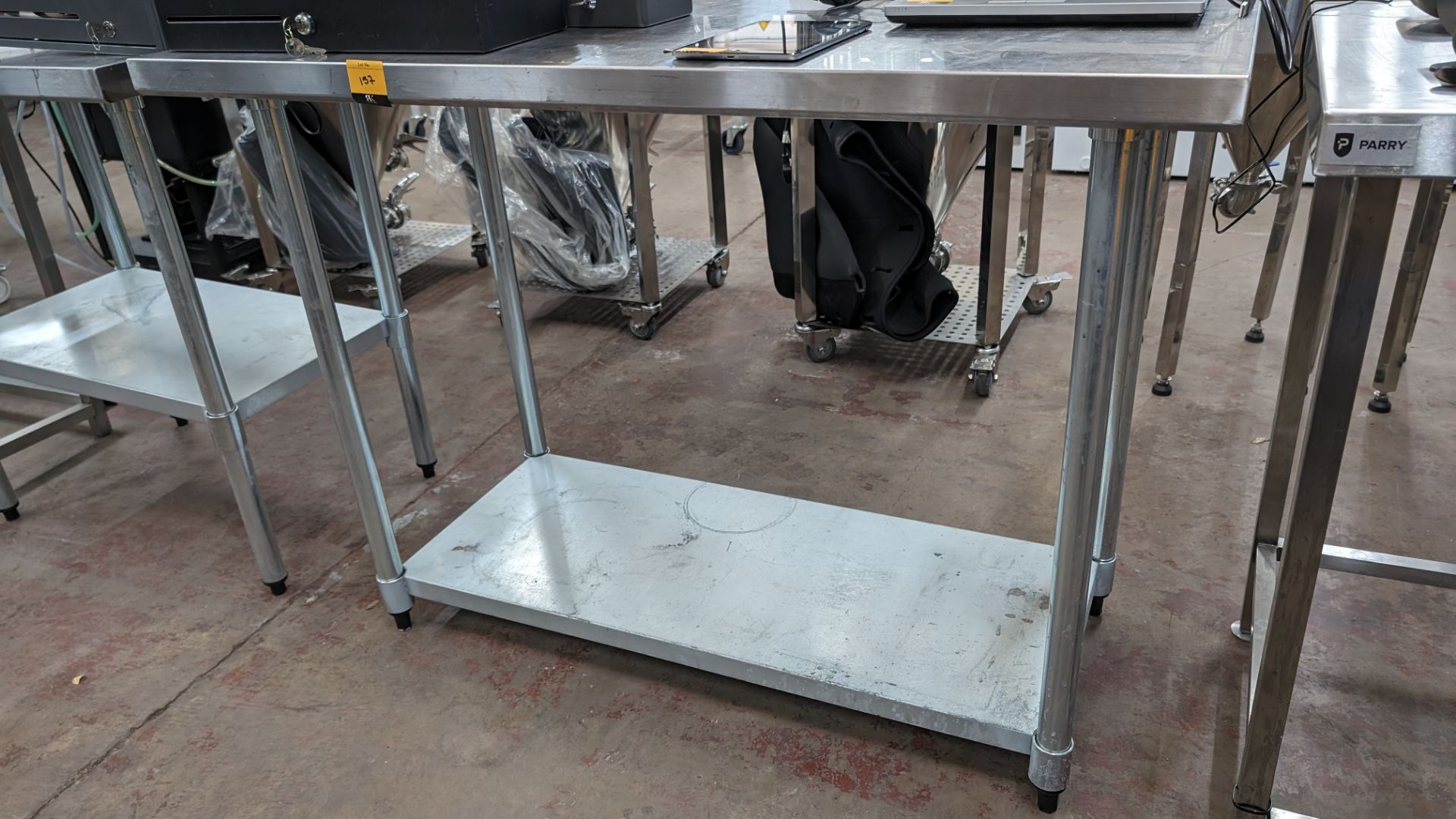 Stainless steel twin tier table with upstand at rear, max dimensions: 940mm x 610mm x 1220mm - Image 2 of 4