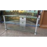 Corner AV stand with 3 glass shelves. Stand measures approximately 1060mm x 460mm x 475mm