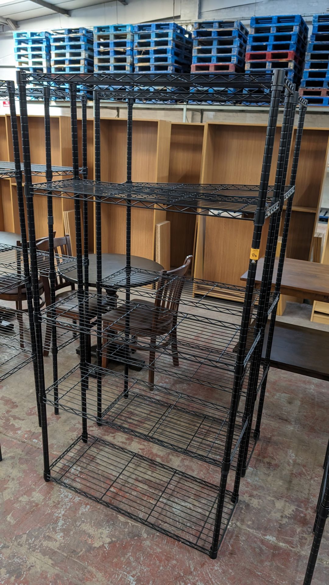 2 off black metal bolt free bolt free wire racks each with five shelves, each measuring approximatel