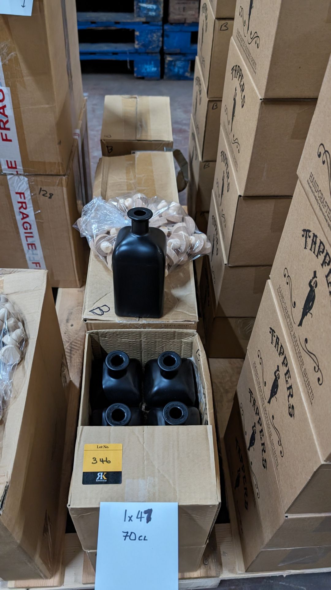 47 off 70cl/700ml professionally painted black glass bottles, each with a stopper. The bottles are