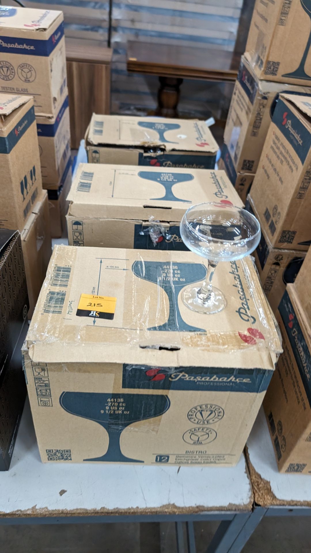 3 off boxes each with 12 cocktail/traditional champagne glasses