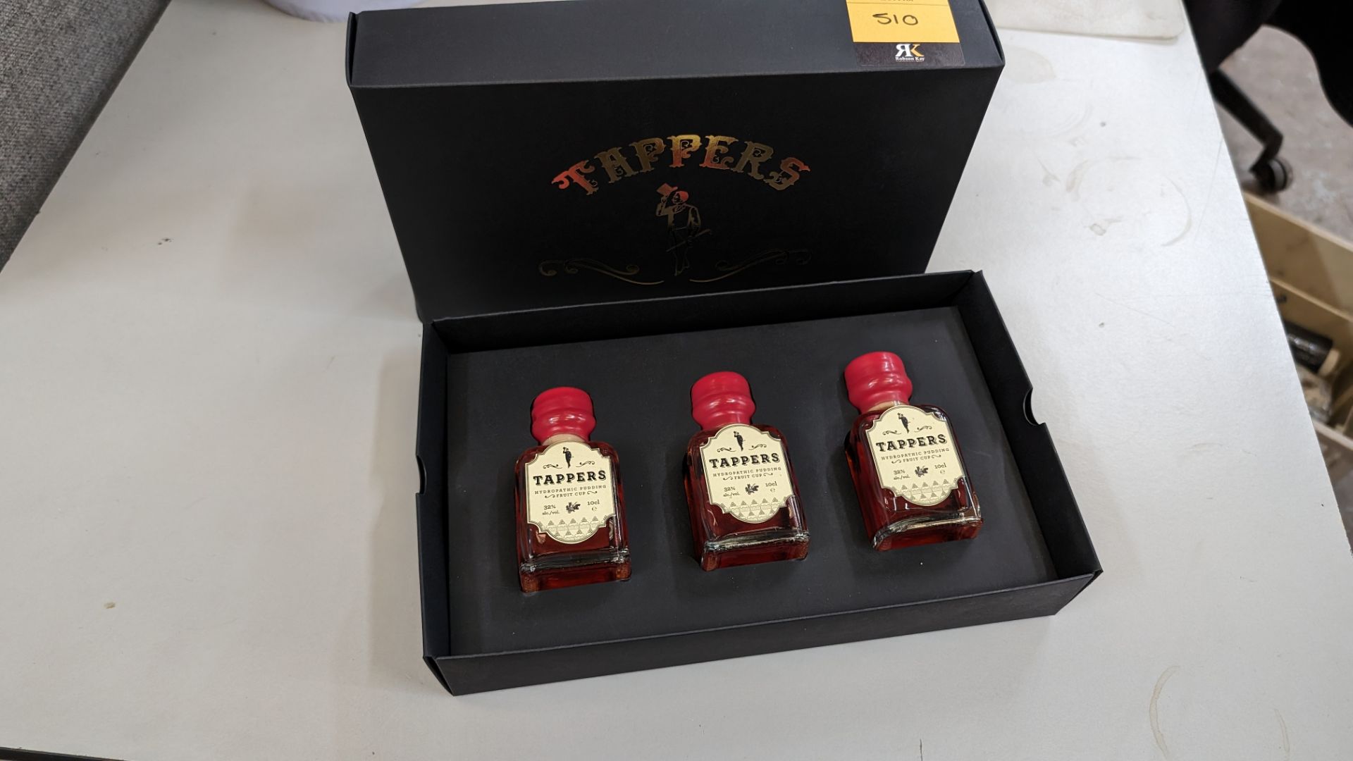 3 off 100ml bottles of Tappers Hydropathic Pudding Fruit Cup, 32% ABV, including a Tappers branded p