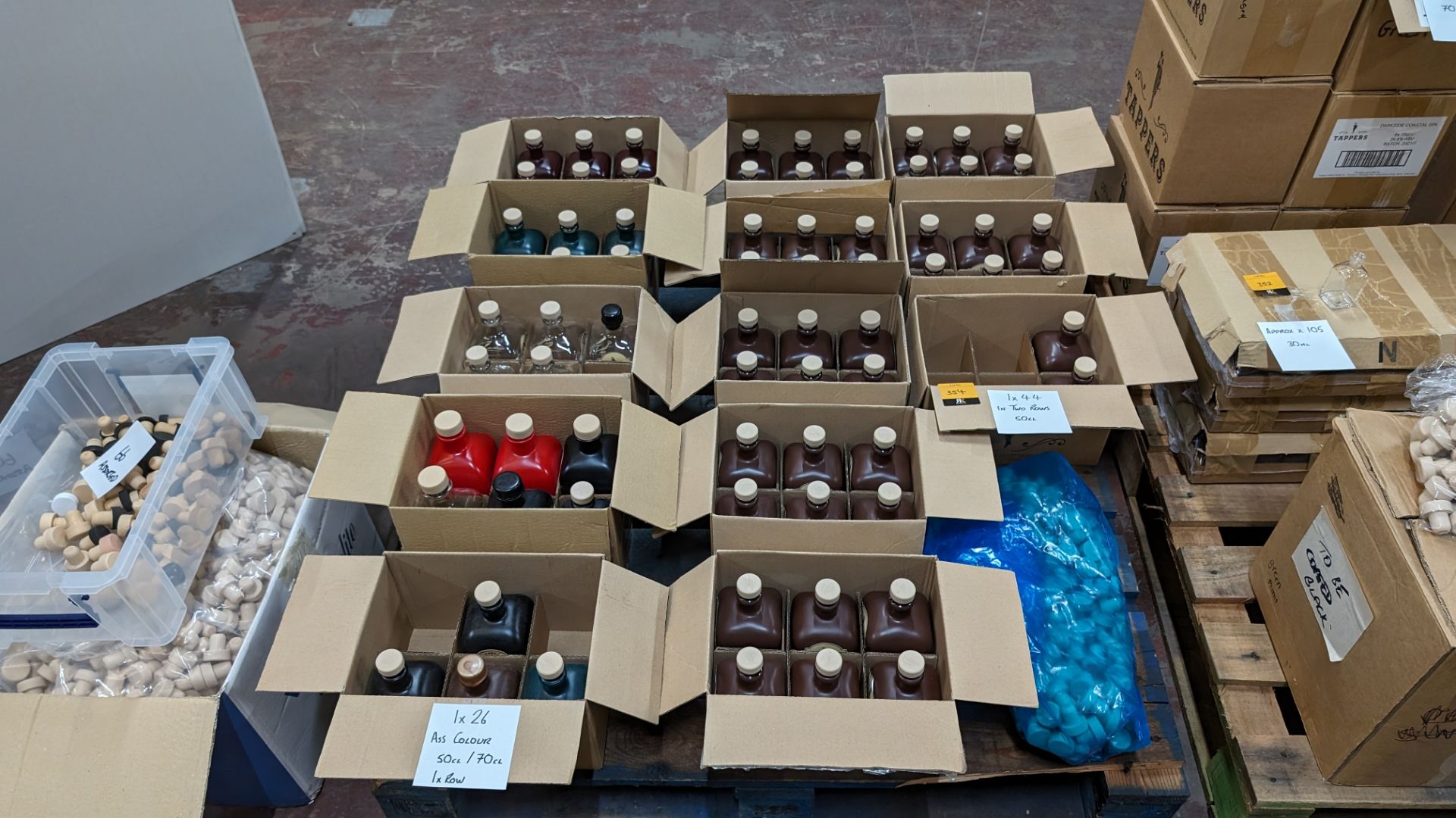 The contents of a pallet of bottles and stoppers. This lot comprises 70 off glass bottles, mostly p - Image 2 of 6