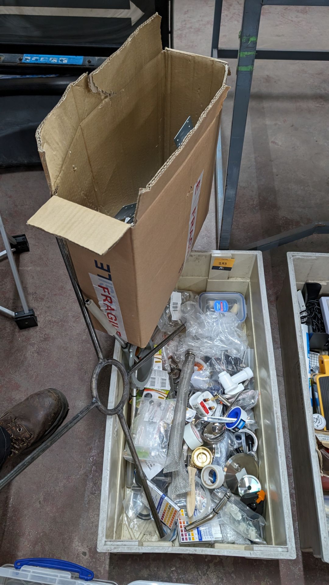 The contents of a crate of hardware and miscellaneous items