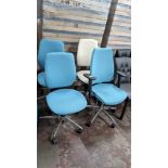 4 off operator's chairs, one of which has arms. 3 of the chairs are finished in a matching turquois