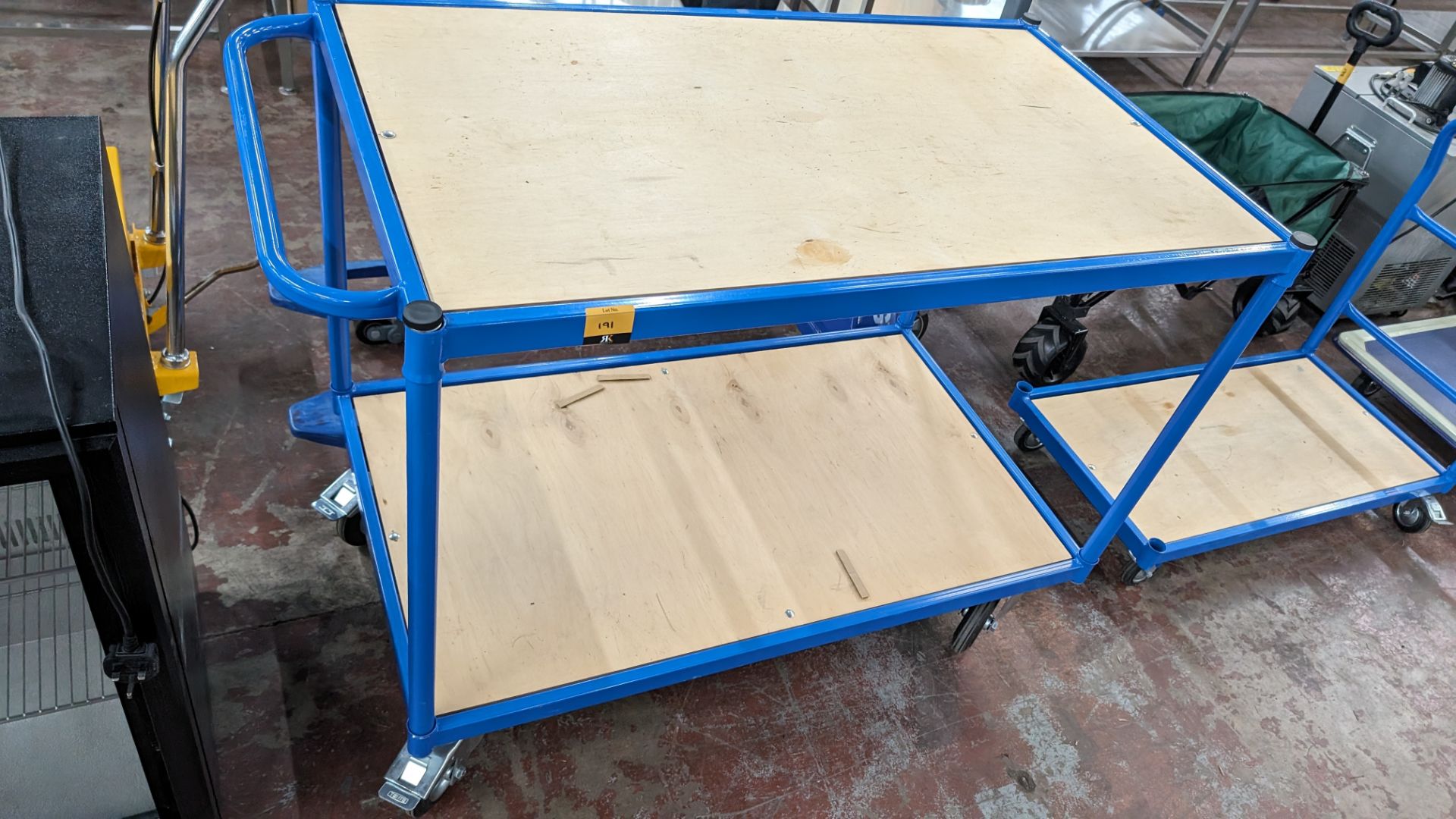 Large heavy duty trolley with braked wheels, comprising blue metal frame and twin plywood shelves - Image 4 of 4