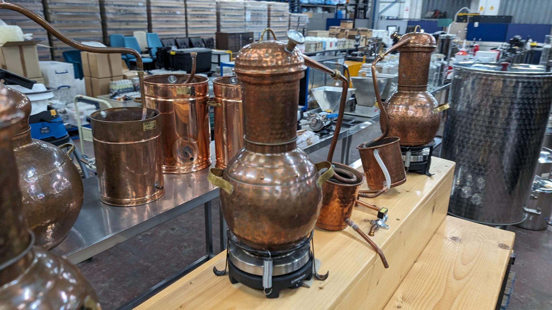 6 off small stills plus mobile bench. This lot comprises a custom made mobile bench with a metal fr - Image 9 of 18