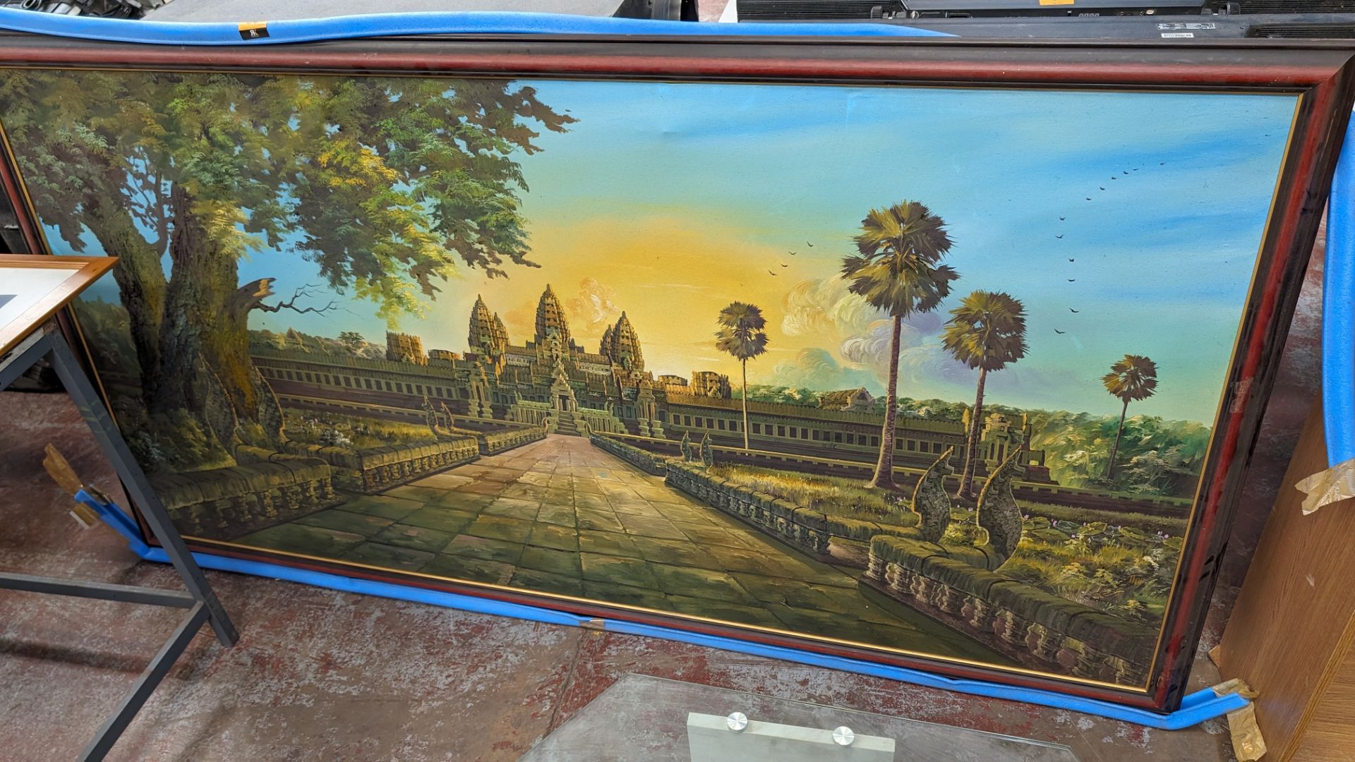 Large Cambodian oil painting of Angkor Wat, imported from Cambodia then stretched/framed in the UK.