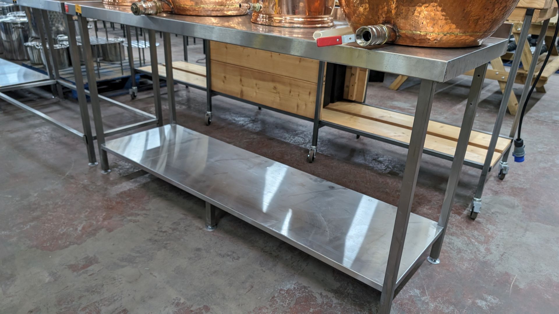 Stainless steel twin tier table with upstand at rear, max dimensions: 920mm x 600mm x 1800mm - Image 2 of 3