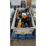 The contents of a crate of assorted soft drinks - mostly with a best before date of 2024