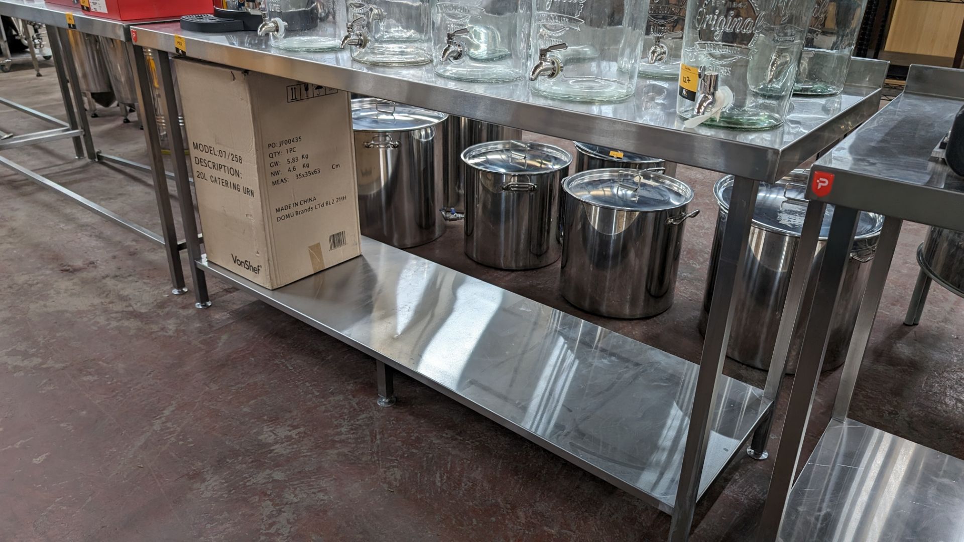 Stainless steel twin tier table with upstand at rear, max dimensions: 920mm x 600mm x 1800mm - Image 2 of 3