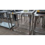 Stainless steel table with upstand at rear, max dimensions: 920mm x 600mm x 900mm